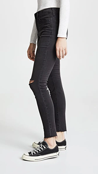 Shop Madewell High Rise Skinny Jeans In Black Sea