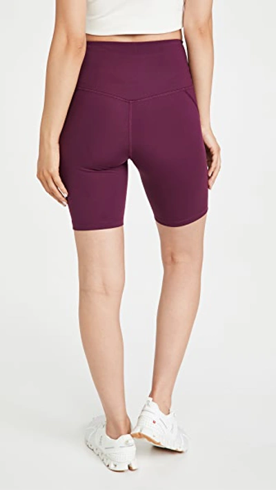 Shop Girlfriend Collective High Rise Bike Shorts In Plum