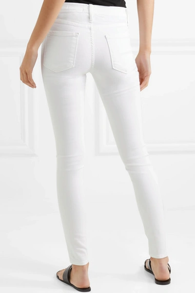 Shop Frame Le Skinny De Jeanne Crop Mid-rise Jeans In White