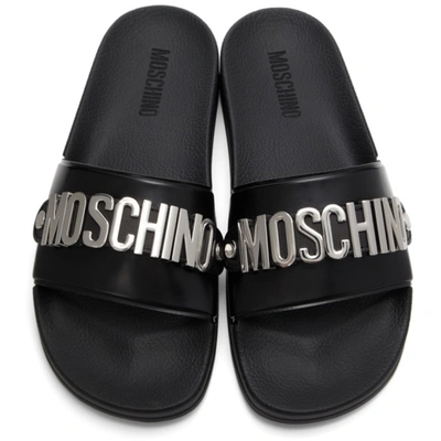 Shop Moschino Black & Silver Logo Lettering Pool Slides In 00a Fantasy Color