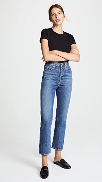 Shop Agolde Pinch Waist High Rise Kick Jeans Placebo