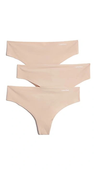 Calvin Klein Underwear 3 Pack Invisibles Thongs In Light Caramel