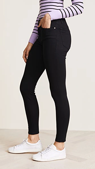 Shop Frame Le High Skinny Jeans Film Noir