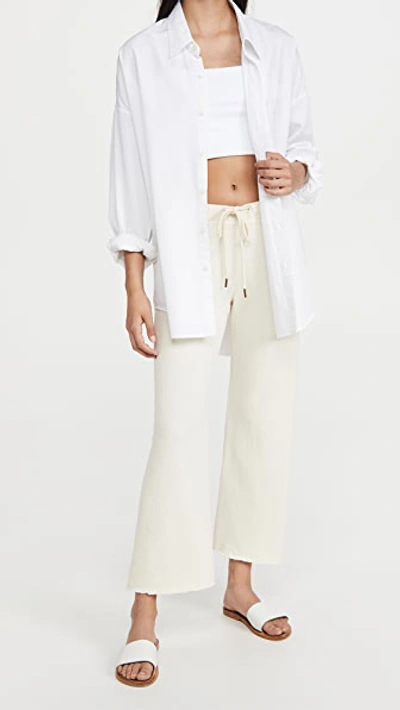 Shop The Great The Wide Leg Cropped Sweatpants In Washed White