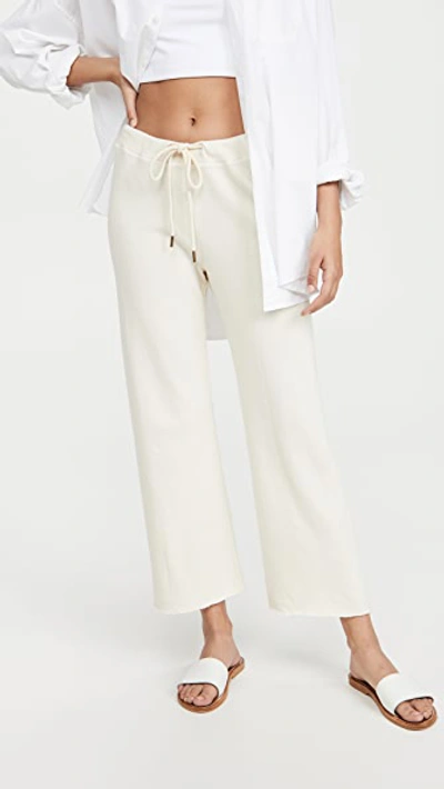 Shop The Great The Wide Leg Cropped Sweatpants In Washed White