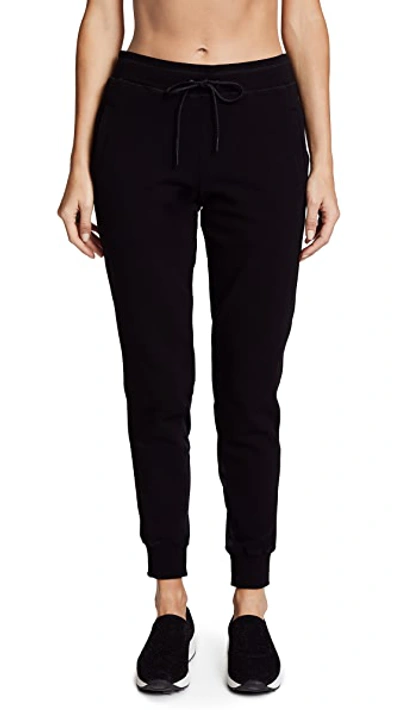 Shop Alala Skinny Sweatpants In Black