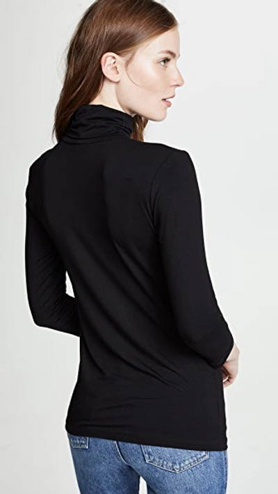 L Agence Aja Tortoiseshell Print Jersey Turtleneck Top In Black