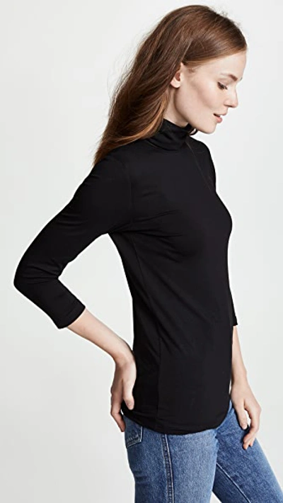 L Agence Aja Tortoiseshell Print Jersey Turtleneck Top In Black