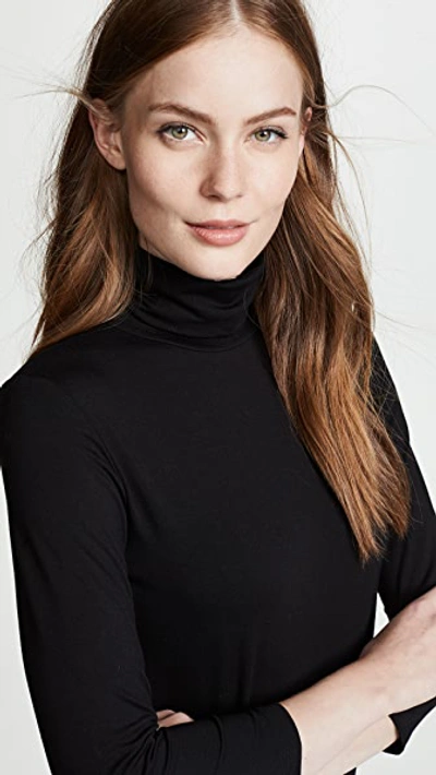 L Agence Aja Tortoiseshell Print Jersey Turtleneck Top In Black