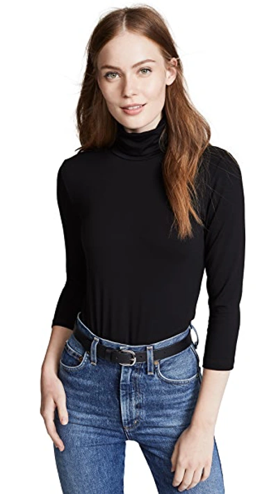 L Agence Aja Tortoiseshell Print Jersey Turtleneck Top In Black