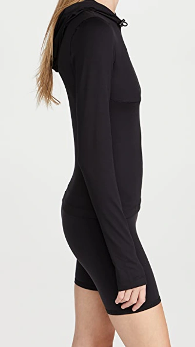Shop Alo Yoga Alosoft Visionary Hooded Long Sleeve Black