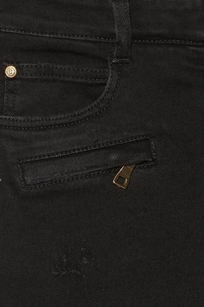 Shop Balmain Moto-style Distressed Low-rise Skinny Jeans In Black