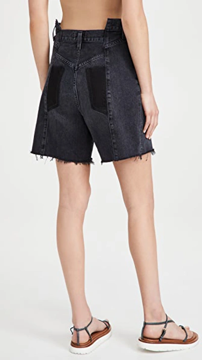 Shop Agolde Pieced Angled Shorts In Shambles