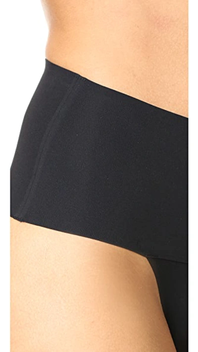 Spanx Undie-tectable Mid-rise Thong In Very Black