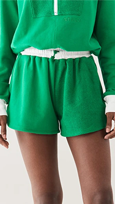 Shop Staud Bungee Track Shorts In Clover