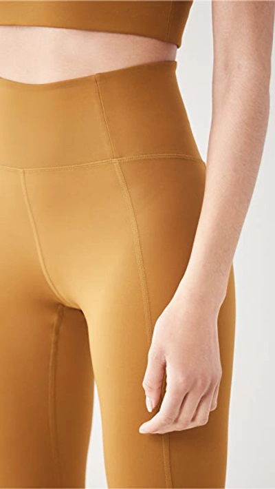 Shop Girlfriend Collective High Rise Compressive Leggings In Saddle