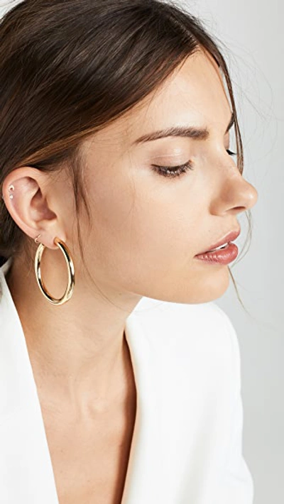 Shop Jennifer Zeuner Jewelry Lou Medium Hoop Earrings In Yellow Vermeil