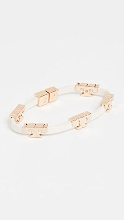 Shop Tory Burch Serif T Stackable Bracelet In Tory Gold/new Ivory