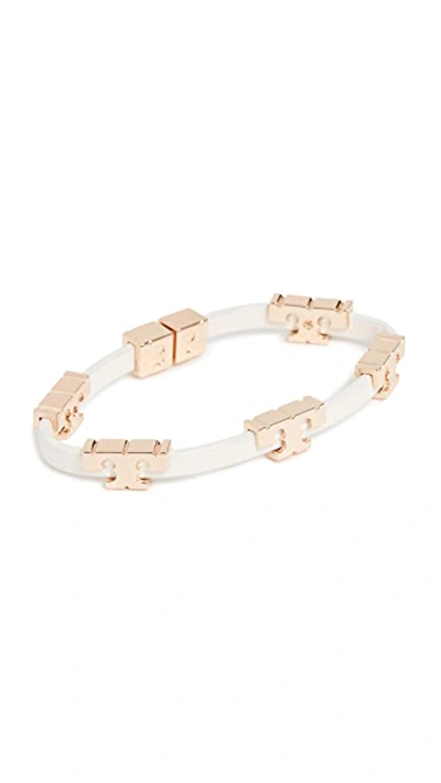 Shop Tory Burch Serif T Stackable Bracelet In Tory Gold/new Ivory