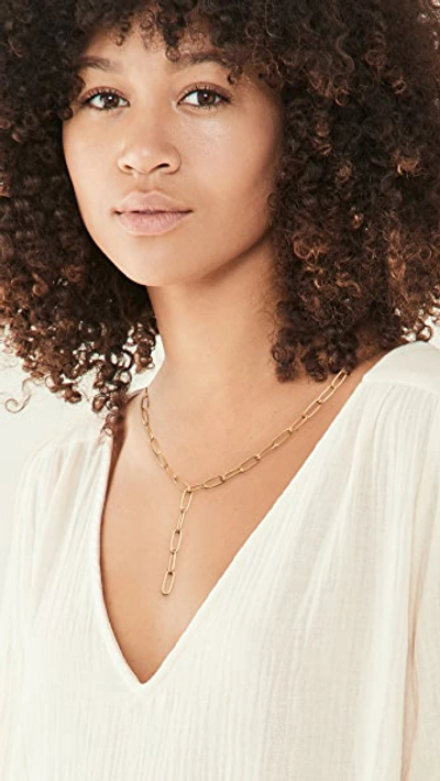 Shop Madewell Libby Paperclip Y Necklace In Vintage Gold