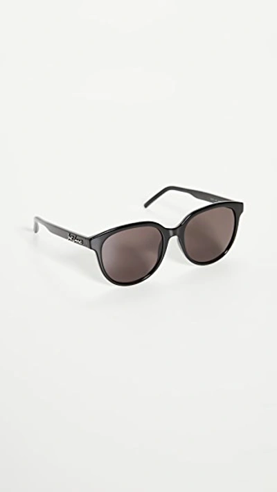 Shop Saint Laurent Signature Round Sunglasses In Black/black/black