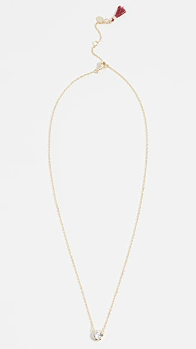 Shop Shashi Solitaire Necklace In Gold/clear
