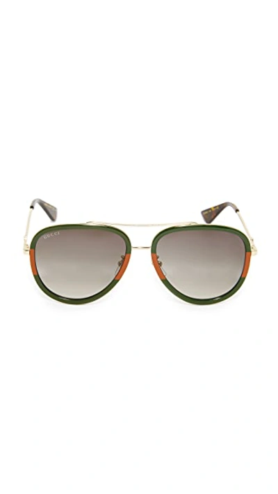 Shop Gucci Pilot Urban Web Block Aviator Sunglasses In Gold/green