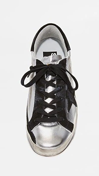 Shop Golden Goose Superstar Sneakers Silver/black 35