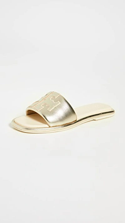 Shop Tory Burch Double T Sport Slides In Spark Gold/new Cream/gold