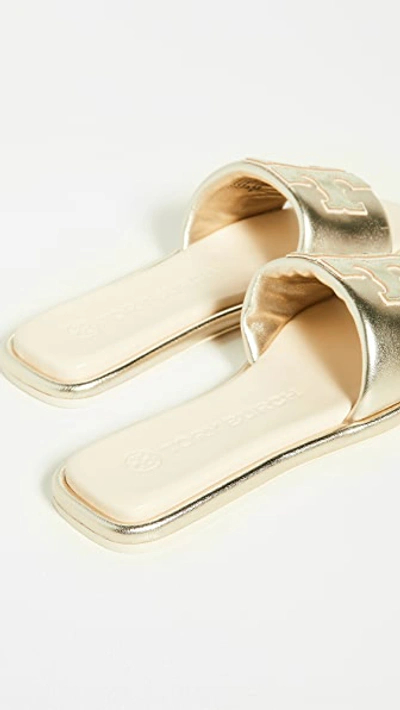 Shop Tory Burch Double T Sport Slides In Spark Gold/new Cream/gold