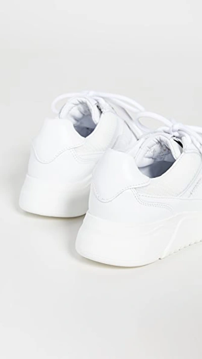 Shop Axel Arigato Genesis Sneakers In White