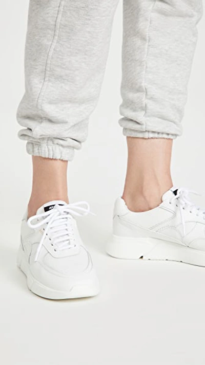 Shop Axel Arigato Genesis Sneakers In White