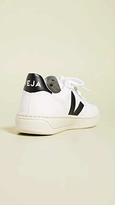 Shop Veja V-10 Lace Up Sneakers Extra White/black