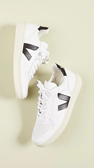 Shop Veja V-10 Lace Up Sneakers Extra White/black