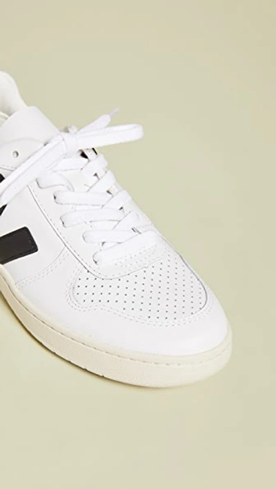 Shop Veja V-10 Lace Up Sneakers Extra White/black