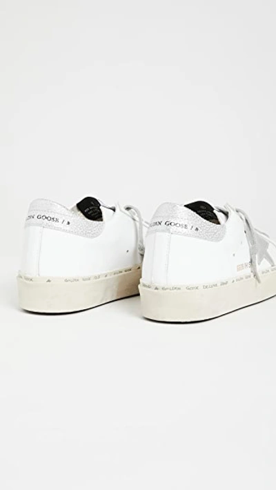 Shop Golden Goose Hi Star Sneakers White/silver 41