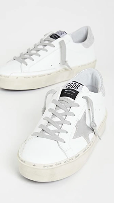 Shop Golden Goose Hi Star Sneakers White/silver 41