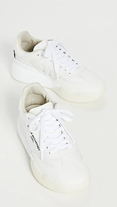 Shop Stella Mccartney Runner Loop Sneakers In White/black