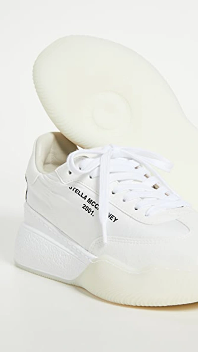 Shop Stella Mccartney Runner Loop Sneakers In White/black