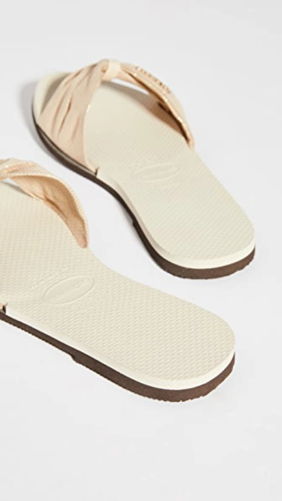 Shop Havaianas You St. Tropez Shine Flip Flops Beige