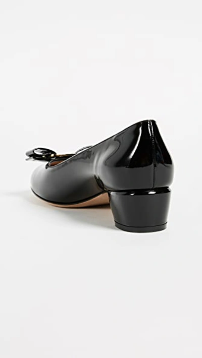 Ferragamo Vara Bow-embellished Patent-leather Pumps In Black