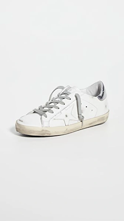 Shop Golden Goose Superstar Sneakers White/silver