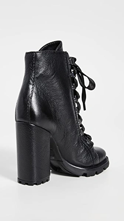 Shop Schutz Zhara Lug Sole Boots In Black
