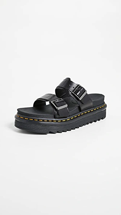 Shop Dr. Martens' Myles Slides Black