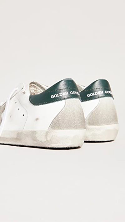 Shop Golden Goose Superstar Sneakers White/dark Green