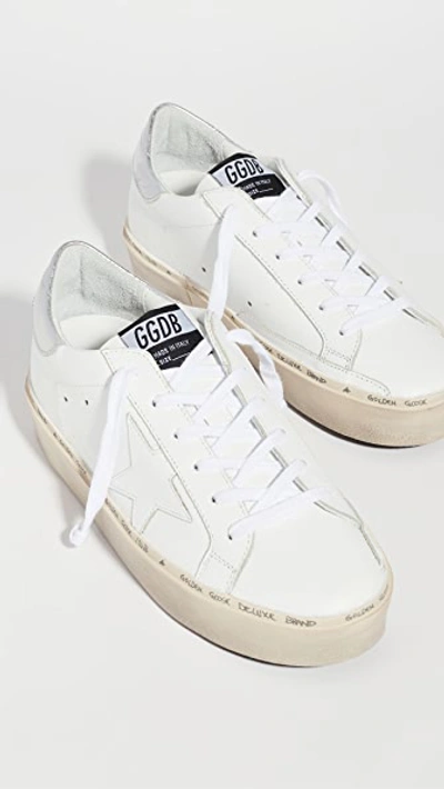 Shop Golden Goose Hi Star Sneakers White/silver
