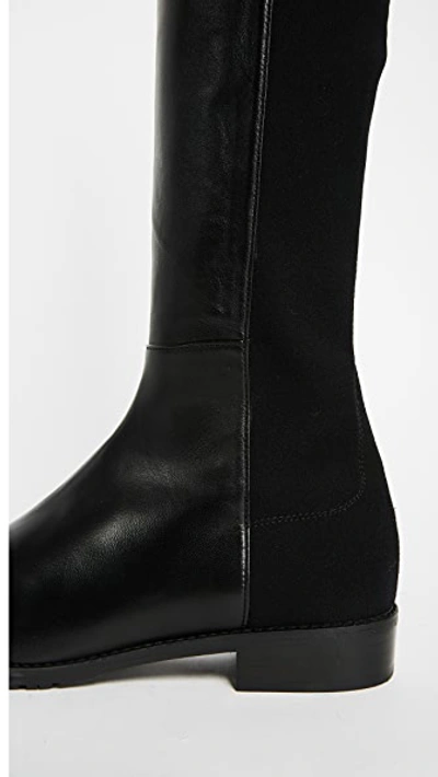 Shop Stuart Weitzman 5050 Flat Boots Black 10