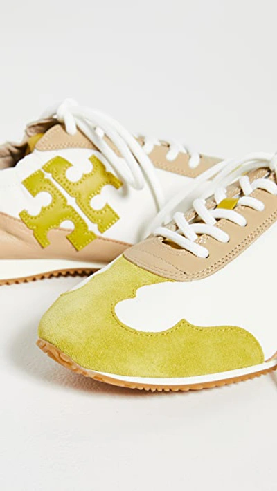 Shop Tory Burch Tory Sneakers In New Ivory/yellow