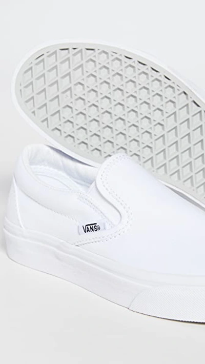 Shop Vans Ua Classic Slip On Sneakers True White