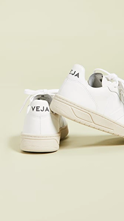 Shop Veja V-10 Lace Up Sneakers Extra White